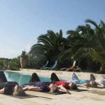 Pilates by the pool in a tailor-made class.