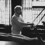 Joseph Pilates teaching his student